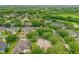 Aerial view of a house and neighborhood, highlighting the property's location and surroundings at 706 Santee Terre Ln, Winter Garden, FL 34787