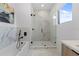 Spa-like bathroom with walk-in shower, soaking tub, marble accents at 6422 Chorus Dr, Mascotte, FL 34753