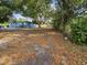 House with a large front yard and mature trees at 2805 Avenue M Nw, Winter Haven, FL 33881