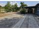 Spacious backyard with patio and lush landscaping at 2805 Avenue M Nw, Winter Haven, FL 33881