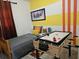 Bedroom with twin bed and air hockey table at 2805 Avenue M Nw, Winter Haven, FL 33881