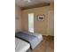 Main bedroom with ensuite bathroom and neutral colored walls at 1124 Chateau Cir, Minneola, FL 34715