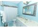 Clean bathroom with a shower/tub combo and vanity at 2037 Apricot Dr, Deltona, FL 32725