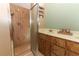Bathroom with double vanity and a walk-in shower at 2037 Apricot Dr, Deltona, FL 32725