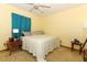 Bright bedroom with a king-size bed and mirrored closet at 2037 Apricot Dr, Deltona, FL 32725