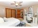Main bedroom with fireplace, vanity, and hardwood floors at 2037 Apricot Dr, Deltona, FL 32725