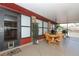 Spacious screened porch with table, chairs, and grill at 2037 Apricot Dr, Deltona, FL 32725
