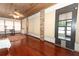 Sunroom with hardwood floors and access to backyard at 2037 Apricot Dr, Deltona, FL 32725