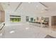Spacious kitchen with breakfast bar and marble floors at 35635 High Pines Dr, Eustis, FL 32736