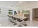 Spacious kitchen with large island, stainless steel appliances, and marble flooring at 35635 High Pines Dr, Eustis, FL 32736
