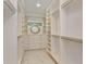 Large walk-in closet with ample shelving and hanging space at 35635 High Pines Dr, Eustis, FL 32736