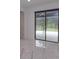 View of sliding glass doors opening to a patio at 35635 High Pines Dr, Eustis, FL 32736