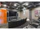 Home theater with comfortable seating and large screen at 200 Southern Pecan Cir # 105, Winter Garden, FL 34787