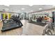 Modern gym featuring treadmills, elliptical machines, and strength equipment at 200 Southern Pecan Cir # 105, Winter Garden, FL 34787