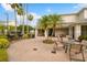 Outdoor community patio with grills and seating areas at 200 Southern Pecan Cir # 105, Winter Garden, FL 34787