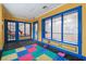 Play area with colorful mats and toys for young children at 200 Southern Pecan Cir # 105, Winter Garden, FL 34787