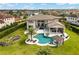 Luxury home with a large pool, spa, and outdoor entertainment area at 4029 Isabella Cir, Windermere, FL 34786