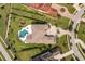 Bird's-eye view of a large home with a pool and landscaped grounds at 4029 Isabella Cir, Windermere, FL 34786