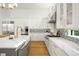 Modern kitchen featuring marble countertops, stainless steel appliances, and hardwood floors at 4029 Isabella Cir, Windermere, FL 34786