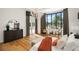 Luxurious main bedroom with stunning pool views and hardwood floors at 4029 Isabella Cir, Windermere, FL 34786