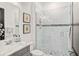 Modern bathroom with a walk-in shower, marble finishes, and stylish fixtures at 4029 Isabella Cir, Windermere, FL 34786