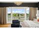 Main bedroom balcony offering stunning views of the property and surrounding landscape at 4029 Isabella Cir, Windermere, FL 34786