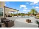 Outdoor patio with seating area, fire pit and pool access at 4029 Isabella Cir, Windermere, FL 34786