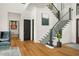 Elegant entryway with hardwood floors and a grand staircase at 4029 Isabella Cir, Windermere, FL 34786