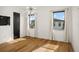 Spacious bedroom with hardwood floors and large windows at 4029 Isabella Cir, Windermere, FL 34786