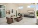 Outdoor kitchen with stainless steel appliances and seating area at 4029 Isabella Cir, Windermere, FL 34786