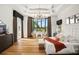 Spacious main bedroom with large windows, hardwood floors, and a luxurious feel at 4029 Isabella Cir, Windermere, FL 34786