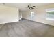 Spacious living room with neutral walls and carpet flooring at 3696 Sagefield Dr, St Cloud, FL 34773
