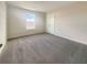 Well-lit bedroom with carpet flooring and a large closet at 3696 Sagefield Dr, St Cloud, FL 34773