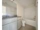 Bathroom with tub, shower, and granite countertop at 3696 Sagefield Dr, St Cloud, FL 34773