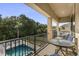 Private balcony overlooking the pool and backyard at 860 Desert Mountain Ct, Reunion, FL 34747