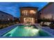 Backyard with a refreshing pool and relaxing patio furniture at 860 Desert Mountain Ct, Reunion, FL 34747