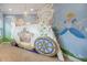 Charming bedroom with Cinderella mural and carriage bunk bed at 860 Desert Mountain Ct, Reunion, FL 34747