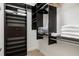 Large walk-in closet with ample shelving and hanging space at 860 Desert Mountain Ct, Reunion, FL 34747