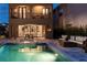 Luxury pool and spa with patio furniture and outdoor seating at 860 Desert Mountain Ct, Reunion, FL 34747