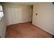 Bedroom with double door closet and neutral carpeting at 1879 Lake Emma Rd, Longwood, FL 32750