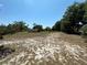 Spacious grassy lot, partially shaded with a motor home parked at 1879 Lake Emma Rd, Longwood, FL 32750