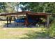 Covered outdoor storage area for a boat and other equipment at 1879 Lake Emma Rd, Longwood, FL 32750