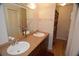 Bathroom with double vanity and a separate shower at 1879 Lake Emma Rd, Longwood, FL 32750