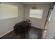 Small dining area with dark vinyl flooring and a simple table and chairs at 1879 Lake Emma Rd, Longwood, FL 32750