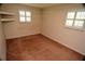 Simple bedroom with neutral carpeting and built-in shelving at 1879 Lake Emma Rd, Longwood, FL 32750