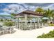 Relaxing poolside bar with seating and umbrellas at 8905 Coconut Breeze Dr, Kissimmee, FL 34747