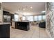Modern kitchen with stainless steel appliances and granite countertops at 7049 Oakwood St, Davenport, FL 33837