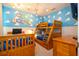 Toy Story themed bedroom with bunk beds and custom wall art at 7049 Oakwood St, Davenport, FL 33837