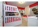 Mickey Mouse themed bedroom with a bunk bed and plenty of storage at 7049 Oakwood St, Davenport, FL 33837