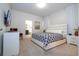 Elegant Primary suite with a plush bed and en-suite bathroom at 7049 Oakwood St, Davenport, FL 33837